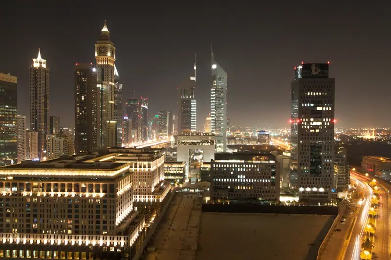 The Dubai skyline lit up at night